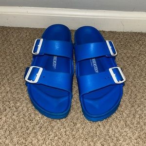Rubber Birkenstocks. Royal blue w/ white buckles. Size 39 european, 8.5 US.
